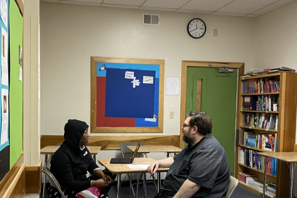 Student and teacher in a classroom